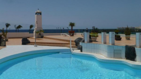 Lanzarote Beachfront Apartment on Las Cucharas Beach with a sea view